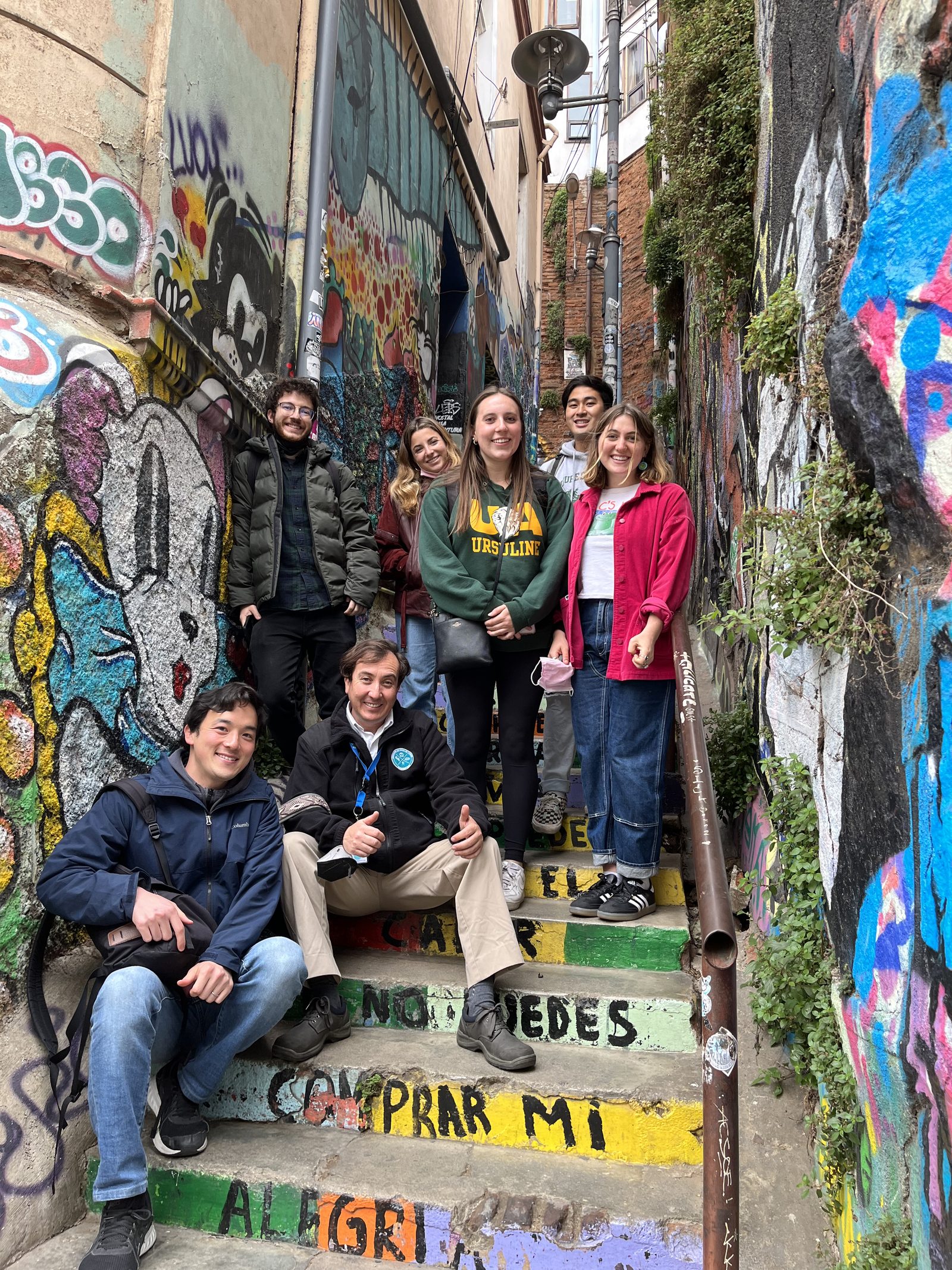 Students on the colorful hillside stairs of Valparaíso